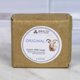 goats milk soap natural by brigid trading company lughnasadh scent hand milled shows a bar of unscented natural goat milk soap on a neutral background kitsap county washington state